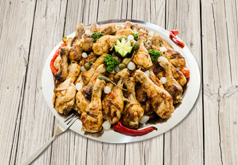 Roasted chicken thigh on platter