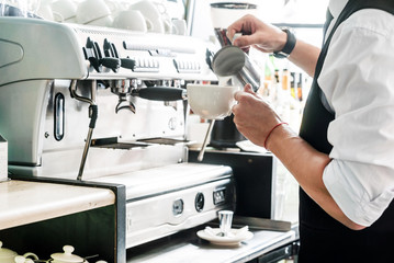 barista making coffee