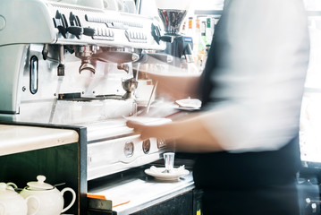 barista making coffee