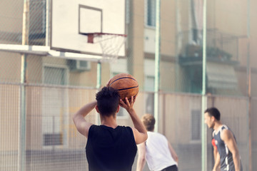 young basketball player ready to shoot