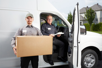 Group of delivery man with a parcel.