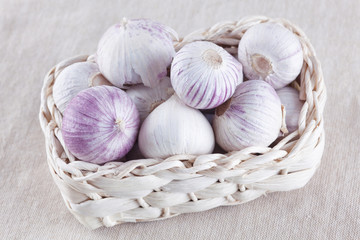 Fresh garlic in a small basket