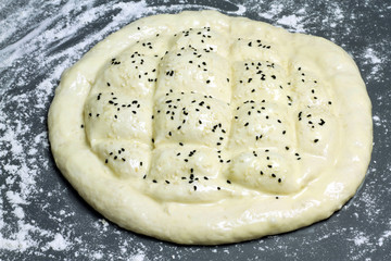 Traditional Turkish ramadan pita bread ( unbaked ), ready to baked in the oven
