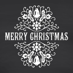 Merry Christmas lettering on chalkboard background. 