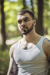 portrait of aggressive muscular guy