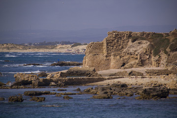 Port ruins in Caesarea. Mediterranean coast of Israel