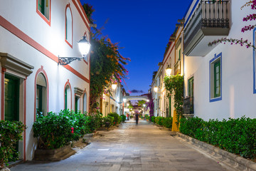 Architecture of Puerto de Mogan at night, a small fishing port on Gran Canaria, Spain.