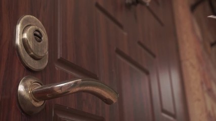 Door closing and opening lock over the handle - Powered by Adobe