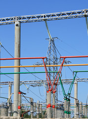 Electrical power high voltage substation encircled with barbed wire fence