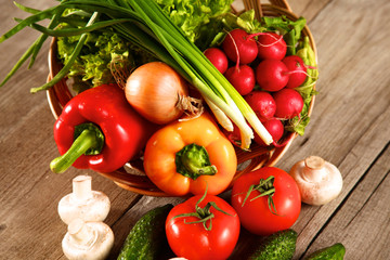 Fototapeta na wymiar Vegetables . Fresh Bio Vegetable in a Basket. Over Nature Background