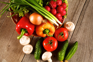 Vegetables . Fresh Bio Vegetable in a Basket. Over Nature Background