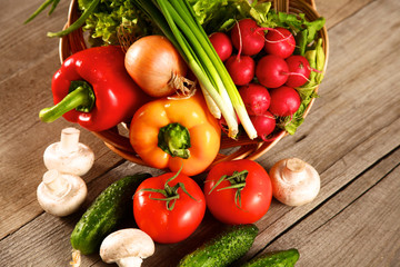 Fototapeta na wymiar Vegetables . Fresh Bio Vegetable in a Basket. Over Nature Background