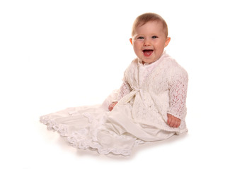 Baby girl in christening gown