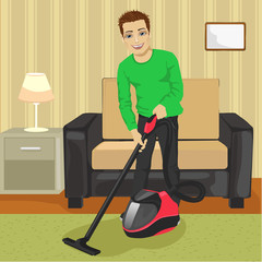 Young man cleaning carpet with vacuum cleaner at home