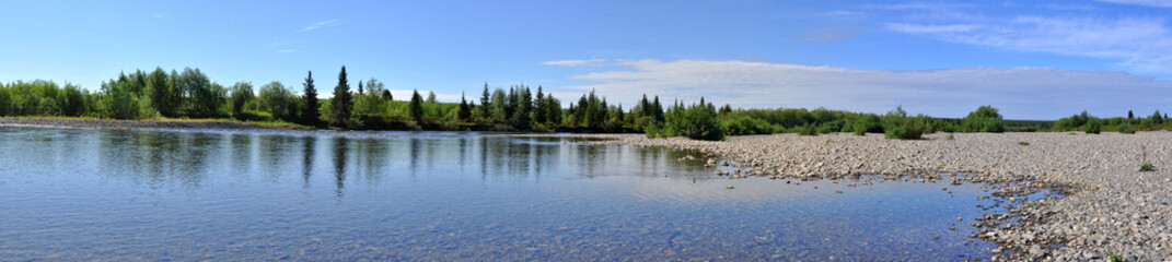 Panoramic river landscape in the polar Urals. © sergunt