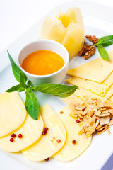 cheese plate with honey and nuts