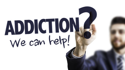 Business Man Pointing the Text: Addiction? We Can Help!