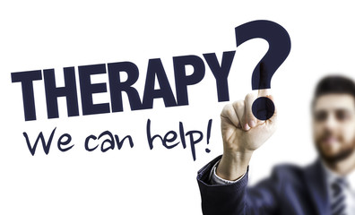 Business Man Pointing the Text: Therapy? We Can Help!