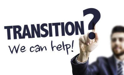 Business Man Pointing the Text: Transition? We Can Help!