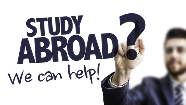 Business Man Pointing the Text: Study Abroad? We Can Help!