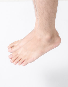 man feet isolated on white background