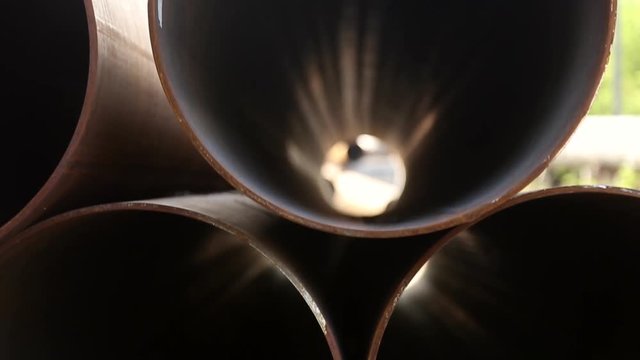 Metal pipelines are stacked, inside view
