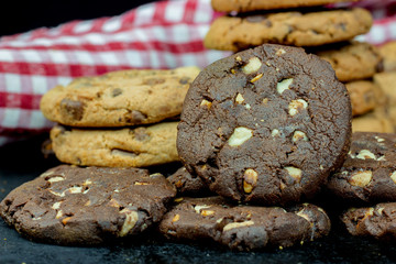 Chocolate chips cookies isolated on black background
