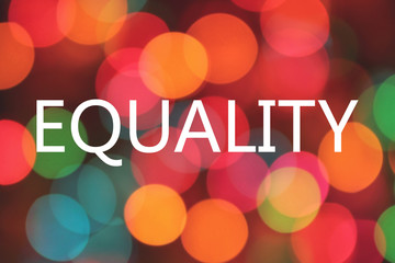 equality word on colorful blurred bokeh background - obrazy, fototapety, plakaty