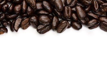 Coffee beans close up macro isolated on white background