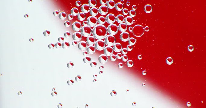 Macro.Heart in the oil babbles on water, abstraction video.
