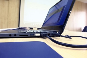 Close-up of laptop in meeting room / Laptop in meeting room