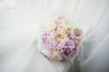 Wonderful luxury wedding bouquet of different flowers