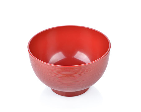 Empty ornge ceramic bowl isolated white background