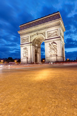 The Arc de Triomphe in Paris at night