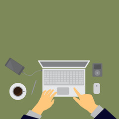 Workplace concept. Top view laptop, notebook, pencil, mobile phone, hands,green background