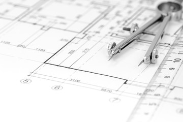 architectural plan with drawing compass closeup