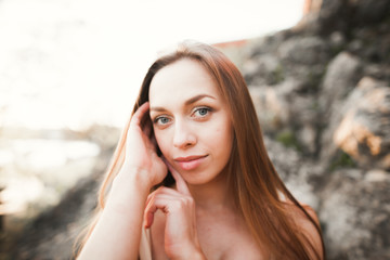 beautiful young woman with long dress close-up portrait