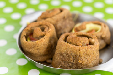 Homemade round rolls with zucchini and ham