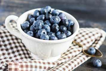 Bilberry on vintage wooden table