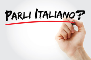 Hand writing Parli Italiano? (do you speak Italian?) with marker, business concept background