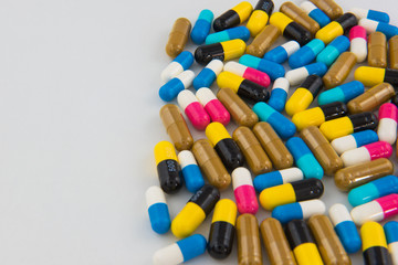 Colorful  Pills and capsules drug background