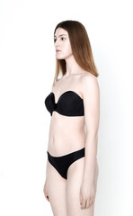 Obraz premium Standard model tests of young pretty woman on a white background