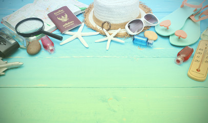 beach accessories on wooden board