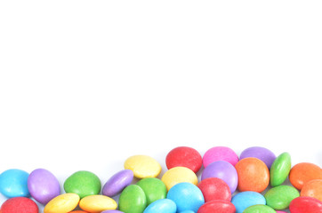 Isolated colored smarties on white background