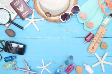 beach accessories on wooden board