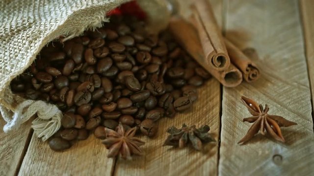Close-up of coffee beans with star anise and cinnamon.
