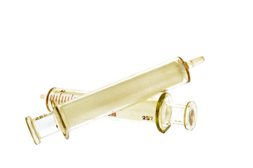 Plastic syringe isolated on white background