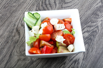 Salad with mozzarella, tomato and cucumber