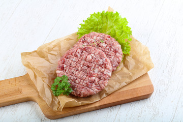 Raw burger cutlet