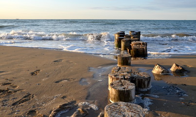 old wooden pier on beach